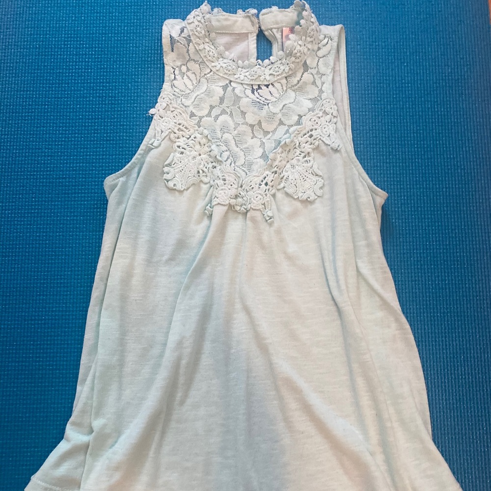 High neck, light blue, flowy tank top.